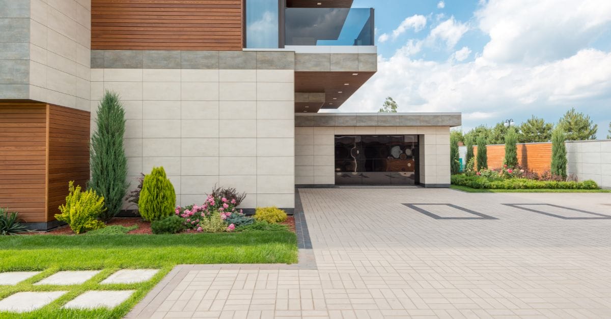 Untitled design (78) Modern house with pavers and wall tiles