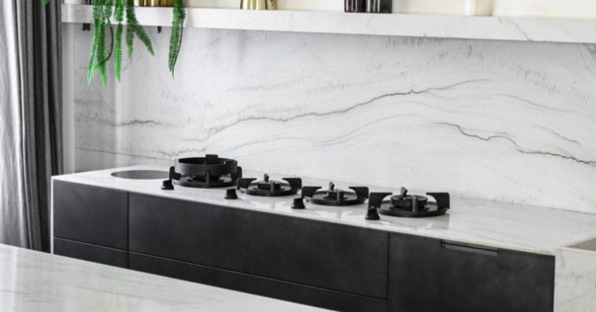 Untitled design (85) porcelain splashback in kitchen with black stove burners